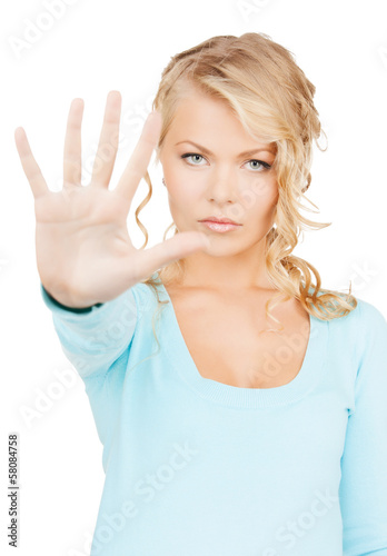 Photo: woman making stop gesture woman making stop gesture