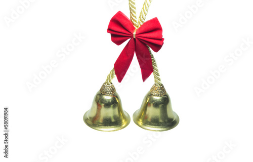 Photo: Real golden christmas bells with red bow Real golden christmas bells with red bow