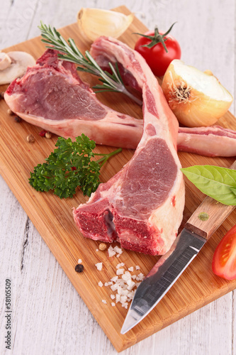 Photo: raw lamb chop raw lamb chop