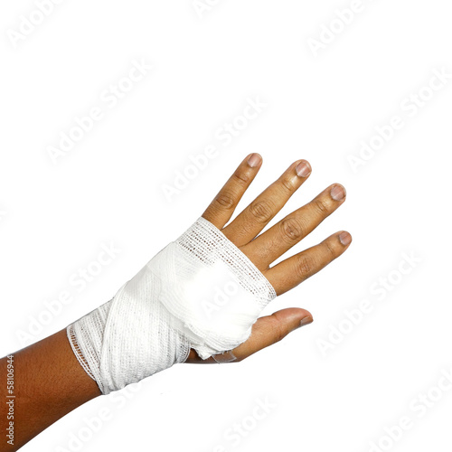 Photo: White medicine bandage on human injury hand White medicine bandage on human injury hand