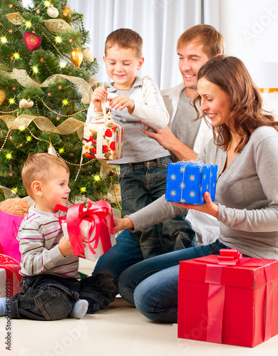 Photo: Christmas Big Family with Children near the Christmas Tree Christmas Big Family with Children near the Christmas Tree