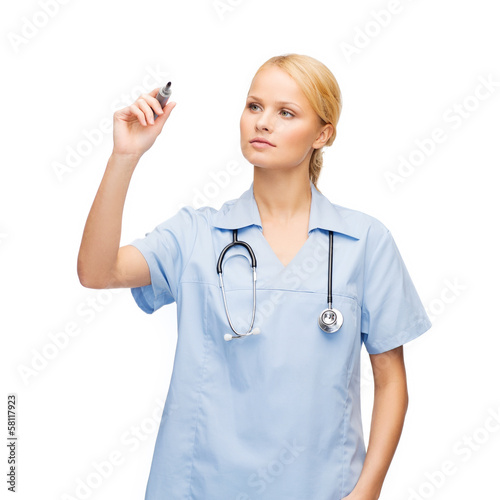 Photo: doctor or nurse working with something imaginary doctor or nurse working with something imaginary