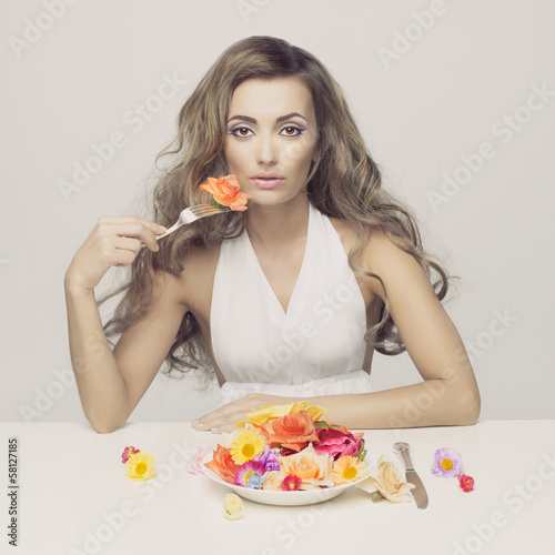 Photo: Lady eats flowers Lady eats flowers