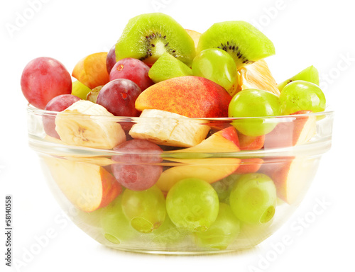 Photo: Fruit salad bowl isolated on white Fruit salad bowl isolated on white
