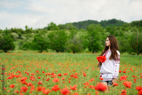 Photo: Ukrainian girl in poppy field Ukrainian girl in poppy field