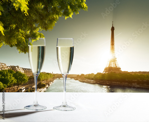 Photo: champaign Glasses and Eiffel tower in Paris champaign Glasses and Eiffel tower in Paris