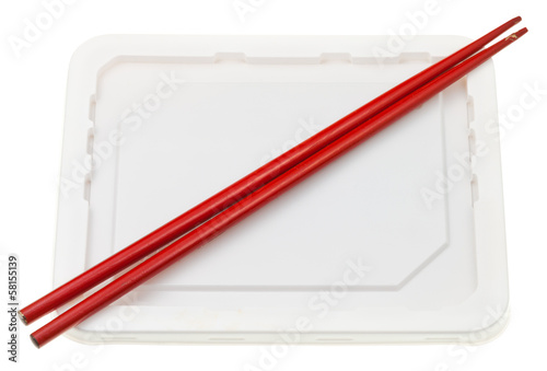 Photo: cup with instant ramen and red chopsticks cup with instant ramen and red chopsticks