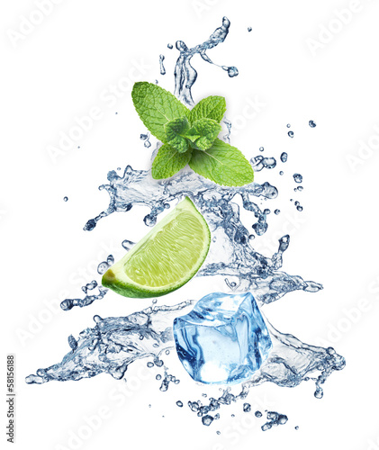 Photo: Ice cubes, mint leaves and lime on a white Ice cubes, mint leaves and lime on a white