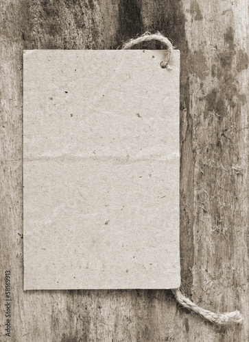 Photo: price tag label on wooden background price tag label on wooden background