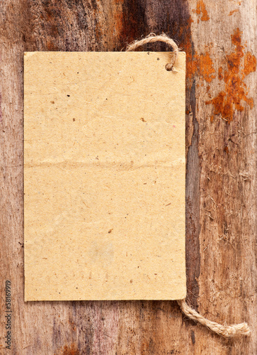 Photo: price tag label on wooden background price tag label on wooden background
