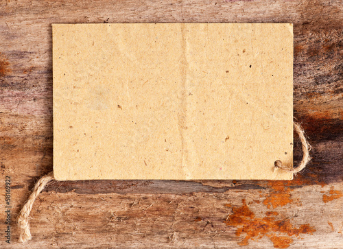 Photo: price tag label on wooden background price tag label on wooden background