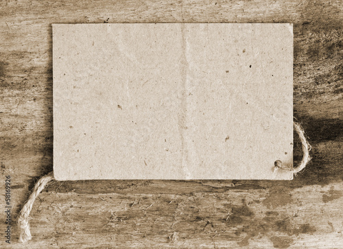 Photo: price tag label on wooden background price tag label on wooden background