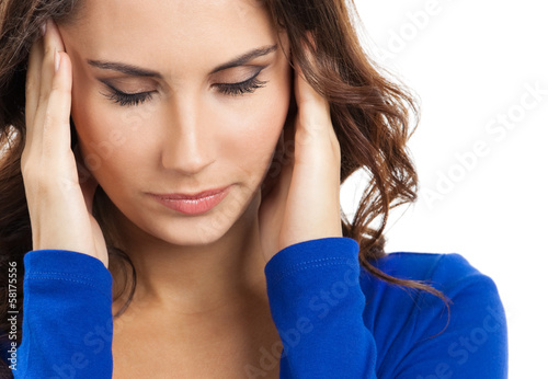 Photo: Thinking, tired or ill with headache young woman Thinking, tired or ill with headache young woman