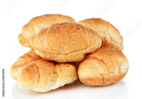 Photo: Tasty croissants isolated on white Tasty croissants isolated on white