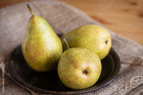 Photo: Fresh ripe pears on natural background. Fresh ripe pears on natural background.