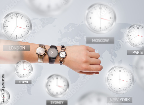 Photo: Clocks and time zones over the world concept Clocks and time zones over the world concept