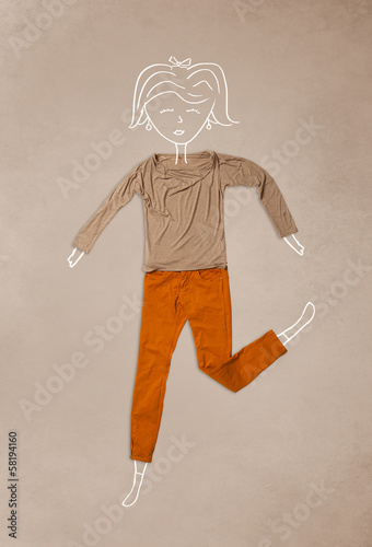 Photo: Placed clothes in action with woman drawing Placed clothes in action with woman drawing