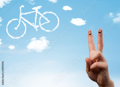 Photo: Happy smiley fingers looking at a bicycle shapeed cloud Happy smiley fingers looking at a bicycle shapeed cloud