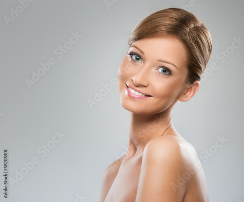 Photo: Beautiful woman with naked shoulder Beautiful woman with naked shoulder