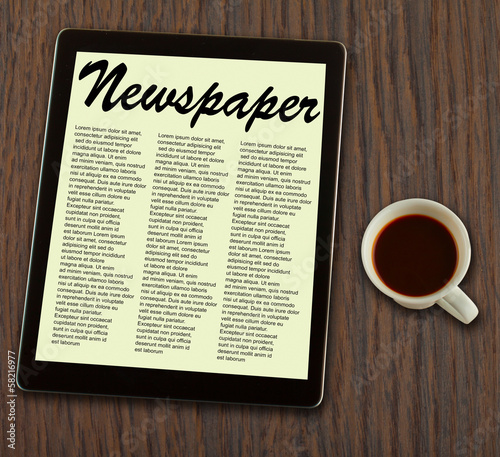 Photo: Newspaper on tablet Newspaper on tablet
