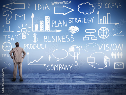 Photo: Businessman looking at Innovation plan. Businessman looking at Innovation plan.