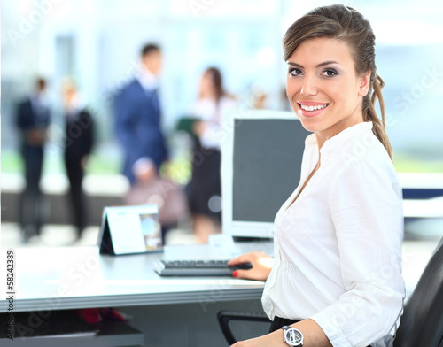 Photo: Modern business woman in the office Modern business woman in the office