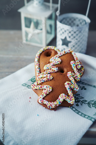 Photo: Gingerbread cookies on a christmas tea towel Gingerbread cookies on a christmas tea towel