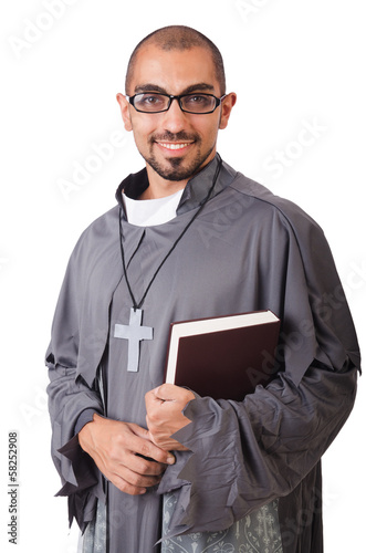 Photo: Young priest isolated on the white Young priest isolated on the white
