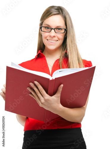 Photo: Young woman holding a book Young woman holding a book