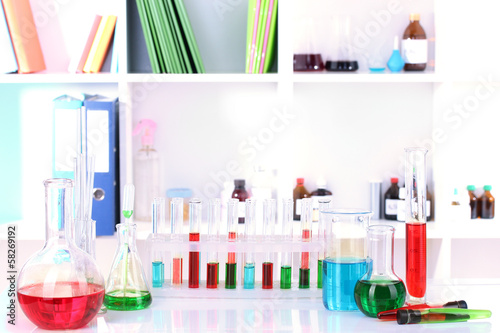 Photo: Different laboratory glassware with color liquid Different laboratory glassware with color liquid