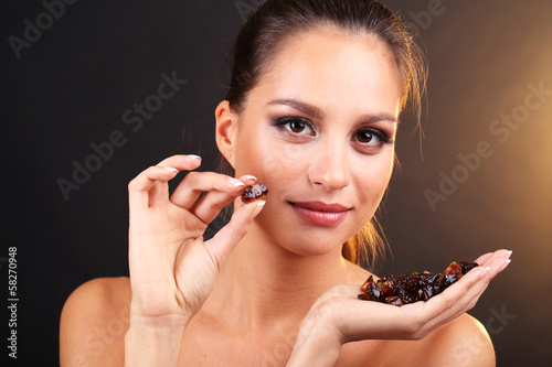 Photo: Portrait of beautiful young girl with caramelized sugar Portrait of beautiful young girl with caramelized sugar