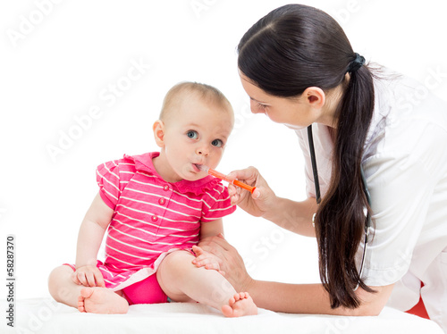 Photo: doctor giving drug to baby girl doctor giving drug to baby girl