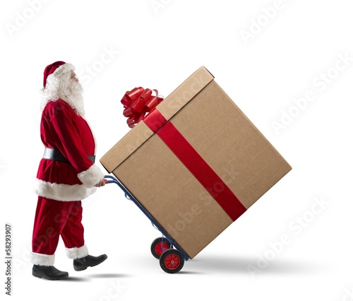 Photo: Santa Claus with big Christmas present Santa Claus with big Christmas present