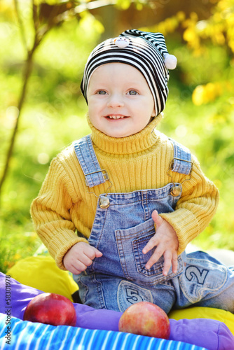 Photo: happy baby boy in fall time happy baby boy in fall time