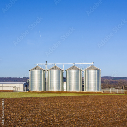 Photo: landscape with silo and blue sky landscape with silo and blue sky