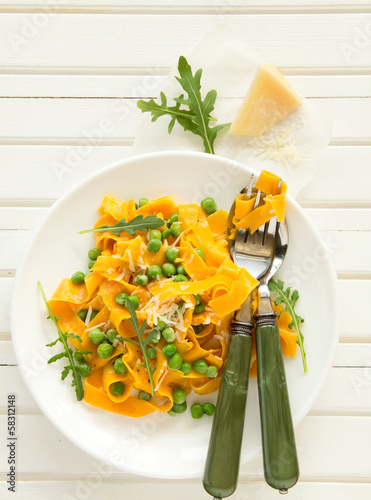 Photo: Pumpkin pasta with tomato and basil. Pumpkin pasta with tomato and basil.
