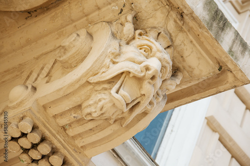Photo: Antique fretwork on historical building in Odessa downtown Antique fretwork on historical building in Odessa downtown