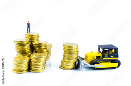 Photo: Raupe schiebt Geld zu Manager Raupe schiebt Geld zu Manager