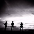 photographer in silhouette photographer in silhouette
