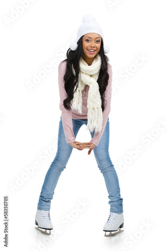 Photo: Funny afro-American girl skating with funny poses. Funny afro-American girl skating with funny poses.