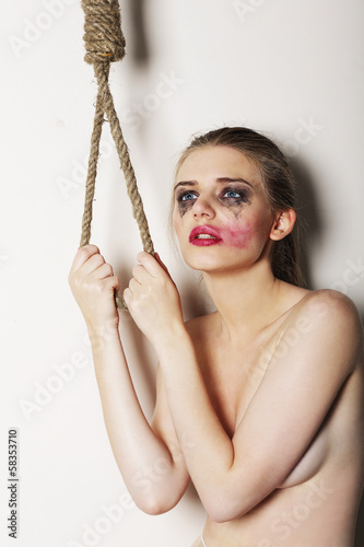 Photo: Sacrifice. Silly Woman in Sorrow wants to Kill herself. Suicide Sacrifice. Silly Woman in Sorrow wants to Kill herself. Suicide