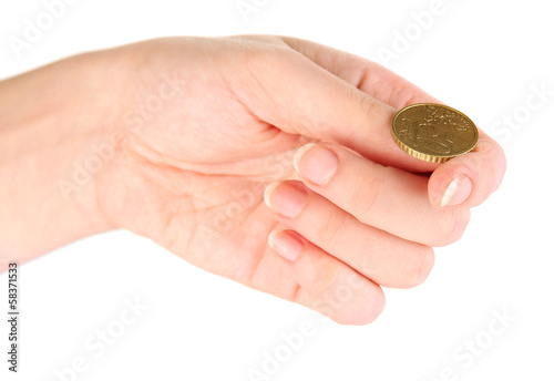 Photo: Hand of woman flipping coin isolated on white Hand of woman flipping coin isolated on white