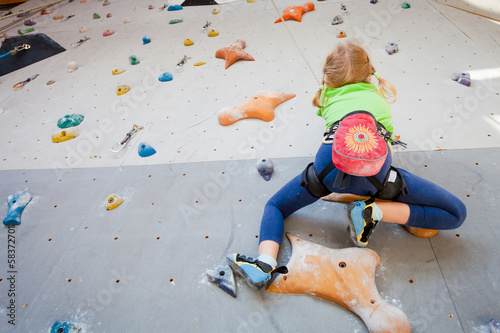 Photo: Little Girl Climbing Rock Wall Little Girl Climbing Rock Wall