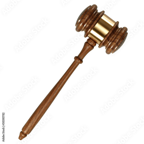 Photo: A wooden judge gavel isolated on white background A wooden judge gavel isolated on white background