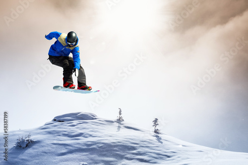 Photo: snowboarder in the snow storm snowboarder in the snow storm