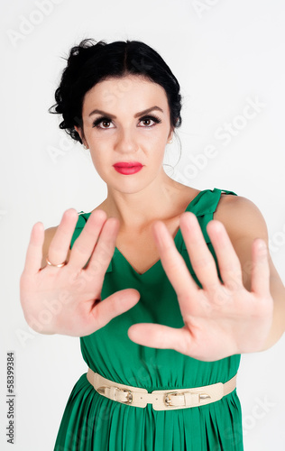 Photo: Pretty girl with stop gesture Pretty girl with stop gesture