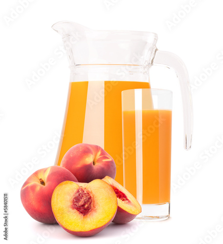 Photo: Peach fruit juice in glass jug Peach fruit juice in glass jug