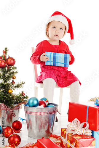 Photo: Santa helper with gift Santa helper with gift