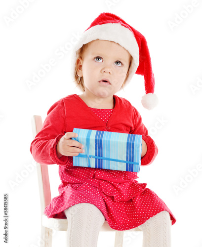 Photo: Santa helper with gift Santa helper with gift