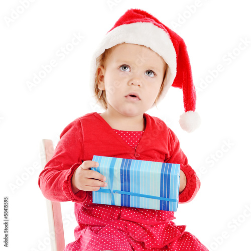 Photo: Santa helper with gift Santa helper with gift